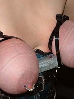 Bound and gagged blonde is presenting a few examples of extreme breast bondage