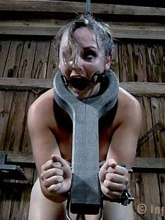 Slave Sasha is cannot move becuase of huge medieval stocks put over her neck and wrists