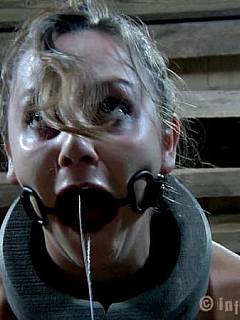 Slave Sasha is cannot move becuase of huge medieval stocks put over her neck and wrists