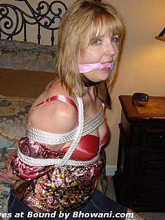 Mature wife is tied up and gagged after blowing her husband's cock
