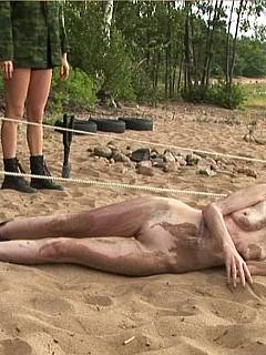 Sweaty nude girl is crawling in the sand: fucked later for not being quick enough