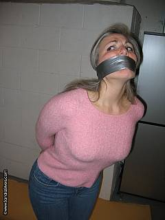 Taped mom is wearing sweater and pantyhose