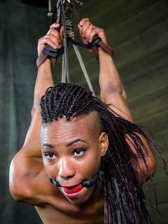 Ebony is in tight ropes with no ability to break free