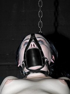 In hellish latex bondage cocoon