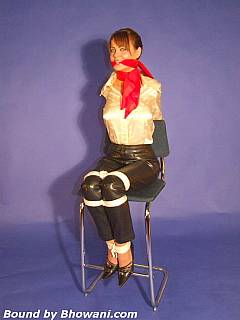 Rope bondage is empowered with silk scarf gag and blindfold