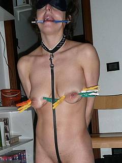 Husband is posting pictures of his MILF wife in bondage: blindfolded and with clothespins on her saggy tits