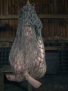 Plumper is put in a fishnet like a luggage after spending some time in a barrel