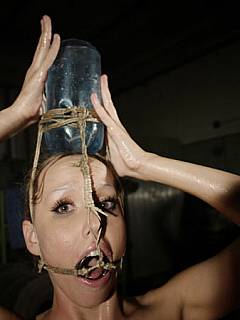 Slavegirl is carrying water on top of her head: getting punished for every drop she spills