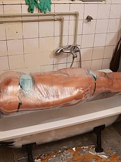 Juicy MILF is wrapped in plastic tape