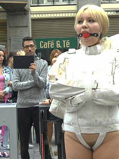 Japanese plumper goes to Europe: she wants to me tamed with public bondage, put in straitjacket and fucked in front of the the crowd