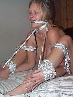 MILF wife is put in many different bondage poses and her pictures are shared all over the Internet