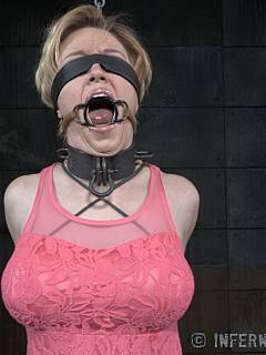 Ring-gagged MILF is out of her cage: tortured with back-bending bondage rack and a toy in her ass