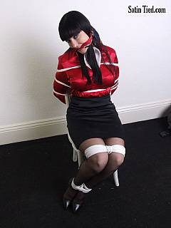 It took a few ropes and a couple of scarves to have classy office woman tied up on a chair, gagged and blindfolded