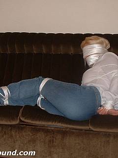 You can unbutton white blouse and enjoy a pair of exposed tits while blond is in bondage, gagged and blindfolded