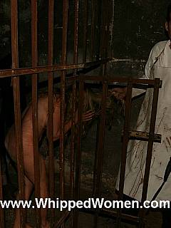 Crazy doctor is keeping captive woman in the dark basement: nude, locked in steel cage and torturing her with whipping on a daily basis