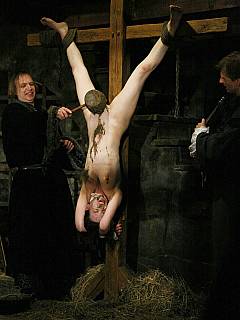 Woman is taken beyond the limits with upside down crucifixion and with hot wax put into her vagina