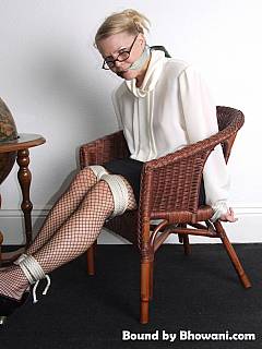 Classy librarian is abused with rope bondage and cleave gag - see her legs in fishnets are tied up nicely