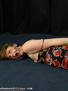 Put in a hogtie with plastic bands and teased with the sex toy is the way  a girl is having her BDSM pleasure
