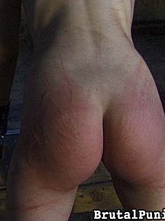 Helpless slut has her bra undone and multiple red whim marks appearing on her back and bare ass