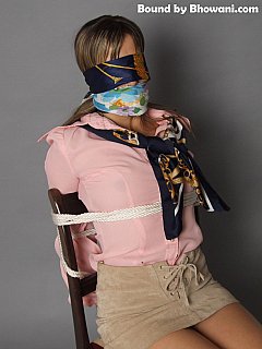 Artistic bondage ends up with hot girl all gagged and blindfolded with silk scarves