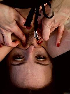Bondage MILF is teased with an electric plug in her vagina and by mistress riding her face