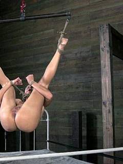 Horny blonde requires tight bondage and a couple of dominators to cope with her sexual hunger