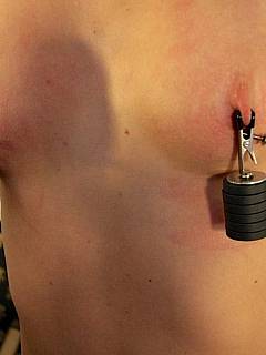 Domestic discipline: husband is educating his wife with nipple clamps and ass whipping