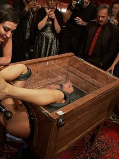 Subgirl is placed inside the box where lots of men can easily fuck her