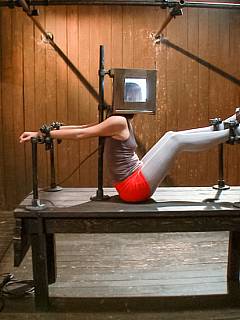 Table-mounted subgirl is butt-plugged and made sexually available for many men