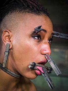 Interracial bondage sluts roped and locked in steel: both have their heads partially shaved