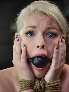 Pretty face is put in bondage and tasting different kinds of gags and sex toys