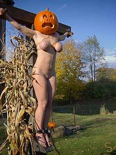 Halloween BDSM spirit: MILF was crucified and had pumpkin over her head, then slut was tied to chair and fucked violently