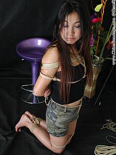 Shared pictures of oriental girlfriend put in hogtied bondage