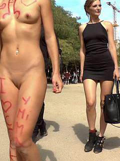 Subgirl is having a degrading body captions all over her body when walking naked in Barcelona